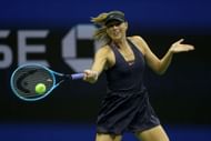 Maria Sharapova of Russia returns a shot during her Women's Singles first round match against Serena Williams at the 2019 US Open - Day 1